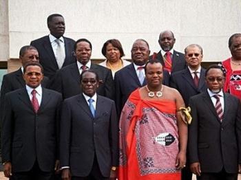 Front row, from left: Tanzanian President Jakaya Kikwete, Zimbabwean President Robert Mugabe, King Mswati III of Swaziland and South African President Kgalema Motlanthe pose for a family photo in Mbabane, Swaziland, during the SADC Summit. Leaders of the SADC regional bloc decided Monday to suspend Madagascar until constitutional order was restored following a take-over by Andry Rajoelina.(AFP) 