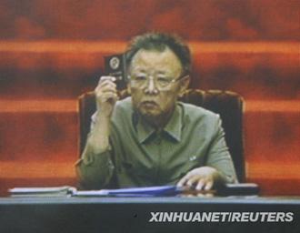 DPRK state television footage shows Kim Jong-Il presiding over the session of the country's parliament.