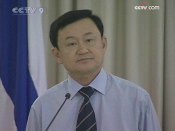 In a telephone message to his followers, Former Tai Prime Minister Thaksin Shinawatra called for a revolution and said he might return from exile to lead it. 