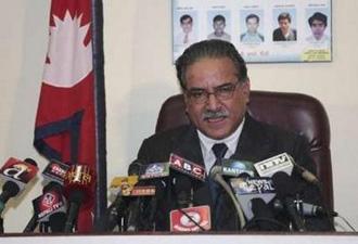 Nepal's Prime Minister Prachanda announces his resignation from his office during a nationwide broadcast in Kathmandu May 4, 2009. REUTERS/Deepa Shrestha