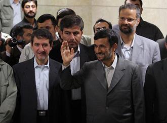 Iranian President Mahmoud Ahmadinejad waves to reporters as he comes to register his candidacy for the upcoming presidential elections at the interior ministry in Tehran on May 8, 2009. Ahmadinejad was the second of the four leading candidates expected to stand in the June 12 election to formally register. (Xinhua/Ahmad Halabisaz)