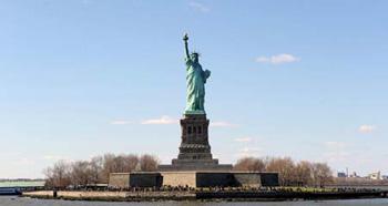 File photo taken on April 12, 2009 shows the Statue of Liberty in New York. Interior Secretary Ken Salazar said on May 8 the crown of the Statue of Liberty will reopen July 4. The statue was closed to the public after the Sept. 11, 2001, terror attacks because of security concerns. (Xinhua/Shen Hong)