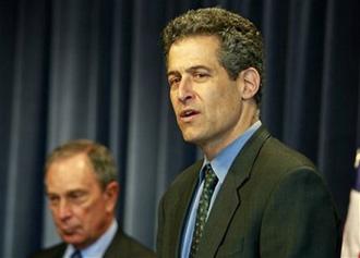 Richard Besser, acting director of the Centers for Disease Control and Prevention, speaks as New York Mayor Michael Bloomberg looks on at left, in Atlanta Wednesday, May 6, 2009.(AP Photo/John Bazemore)