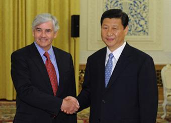 Chinese Vice President Xi Jinping (R) meets with visiting Canadian Foreign Minister Lawrence Cannon at the Great Hall of the People in Beijing, capital of China, May 12, 2009.(Xinhua/Huang Jingwen)