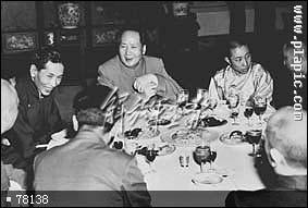 On the celebration feast for signing the agreement of the peaceful liberation of Tibet, Chinese Presider Mao Zedong is talking with 10th Panchen Erdini and Ngapoi Ngawang Jigme friendly.