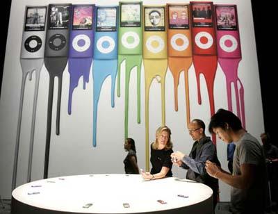 Attendees look over redesigned iPod Nano at Apple's 