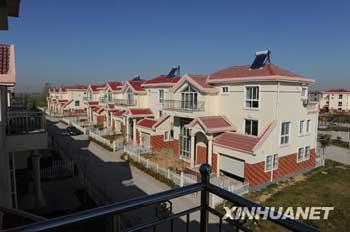 Un quartier de logements ruraux de nouveau type venant d'être construit dans le nouveau village de Xianghe (photo prise le 20 novembre).