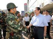 Zhou Yongkang inspecciona el suroeste de Xinjiang