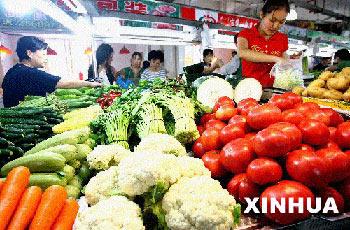 China says different government departments will make joint efforts to implement the newly-approved food safety law, as the country vows to strengthen its food safety controls. 