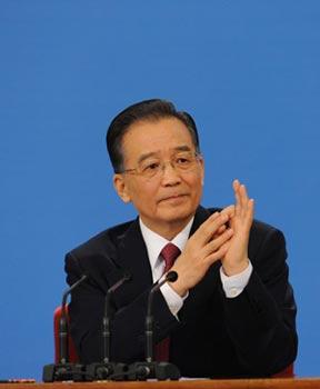 Chinese Premier Wen Jiabao gestures during a press conference after the closing meeting of the Second Session of the 11th National People's Congress (NPC) at the Great Hall of the People in Beijing, capital of China, March 13, 2009. The annual NPC session closed on Friday. (Xinhua Photo)