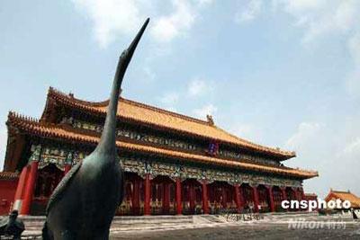 Photo taken on July 15 shows the renovated Hall of Supreme Harmony (Taihedian), the highest and most striking building in the Forbidden City. After two and a half years' renovation, the gate and hall of Supreme Harmony, the Gate of Devine Might (Shenwumen),  reopen to the public from today.  (Photo: cnsphoto)