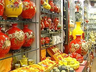 People walk in and out of this retail and wholesale market in Beijing, doing their New Year shopping.