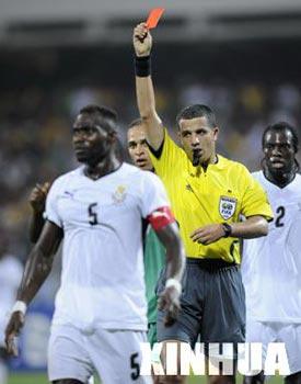 Benouza Mohamed (R2), the referee, shows a red card to Mensah John of Ghana in the quarterfinal match of the Africa Cup of Nations held in Accra, Ghana Feb. 3, 2008. Ghana won the match 2-1 and entered the semifinal. (Xinhua Photo)