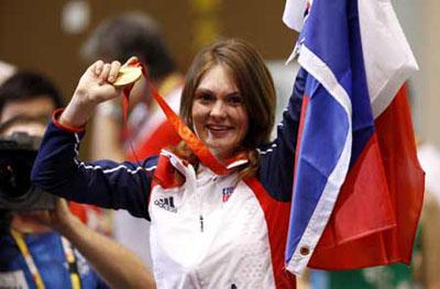 Markswoman Katerina Emmons of Czech celebrates after women's 10m air rifle final awarding ceremony of Beijing Olympic Games at Beijing Shooting Range Hall in Beijing, China, Aug. 9, 2008. Katerina Emmons won the gold medal in the event with 503.5 points. (Xinhua/Bao Feifei)