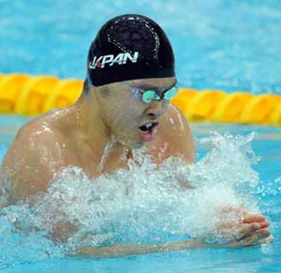 Japan's Kosuke Kitajima won the gold medal of men's 100m Breaststroke at the Beijing Olympic Games. (Xinhua Photo)