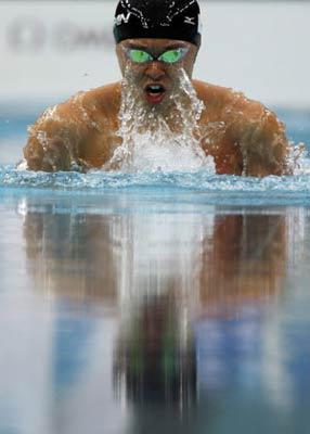 Japan's Kosuke Kitajima won the gold medal of men's 100m Breaststroke at the Beijing Olympic Games. (Xinhua Photo)