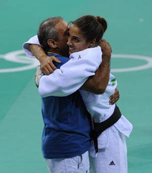 Giulia Quintavalle of Italy celebrates after winning the women's -57kg final of judo at Beijing 2008 Olympic Games in Beijing, China, Aug. 11, 2008. Quintavalle claimed title in this event. (Xinhua/Guo Dayue)