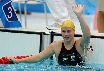 Leisel Jones of Austrlia reacts after the final of women's 100m breaststroke at the Beijing 2008 Olympic Games in the National Aquatics Center, also known as the Water Cube in Beijing, China, Aug. 12, 2008. Leisel Jones set a new Olympic record with 1 minute 5.17 seconds and won the gold medal. (Xinhua/Fan Jun)