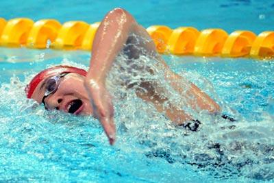 China's Pang Jiaying swims during the final of women's 200m freestyle at the Beijing 2008 Olympic Games in the National Aquatics Center, also known as the Water Cube in Beijing, China, Aug. 13, 2008. Pang grabbed bronze in 1:55.05.(Xinhua/Fei Maohua)