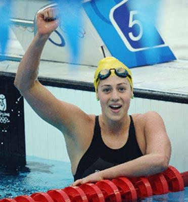 Stephanie Rice of Australia celebrates after the final of women's 200m individual medley at the Beijing 2008 Olympic Games in the National Aquatics Center, also known as the Water Cube in Beijing, China, Aug. 13, 2008. Stephanie Rice won the gold medal with 2 minute 8.45 seconds and set a new world record. (Xinhua/Chen Kai)