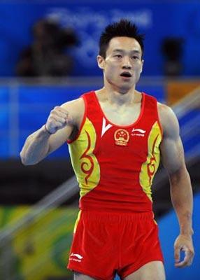 Yang Wei of China gestures after performing on the floor during gymnastics artistic men's individual all-around final of Beijing 2008 Olympic Games at National Indoor Stadium in Beijing, China, Aug. 14, 2008.(Xinhua Photo)