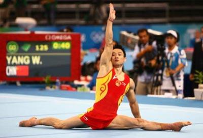 Yang Wei of China performs on the floor during gymnastics artistic men's individual all-around final of Beijing 2008 Olympic Games at National Indoor Stadium in Beijing, China, Aug. 14, 2008.(Xinhua Photo)