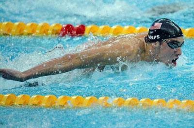 Michael Phelps of the United States swims during the men's 4x100m medley relay final at the Beijing 2008 Olympic Games in the National Aquatics Center, also known as the Water Cube in Beijing, China, Aug. 17, 2008. Phelps won his eighth gold medal at the Beijing 2008 Olympic Games with the help of his teammates with 3 minutes 29.34 seconds.(Xinhua Photo)