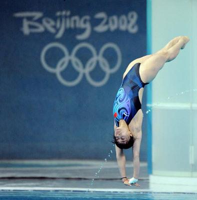 Chinese diver Guo Jingjing competes during the women's 3m springboard final at the Beijing 2008 Olympic Games in the National Aquatics Center, also known as the Water Cube in Beijing, China, Aug. 17, 2008. Guo won the gold medal in the event with a score of 415.35 points. (Xinhua Photo)