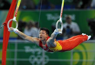 China's Chen Yibing performs on the rings during gymnastics artistic apparatus finals of Beijing 2008 Olympic Games at National Indoor Stadium in Beijing, China, Aug. 18, 2008. Chen Yibing claimed the title of the event with a score of 16.600. (Xinhua/Wang Lei)