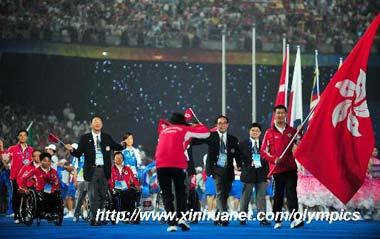 Members of the Paralympic Delegation of China's Hong Kong parade into the National Stadium during the opening ceremony of the Beijing 2008 Paralympic Games in Beijing, China, Sept. 6, 2008. (Xinhua photo)