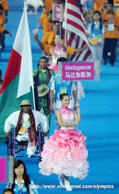 Members of the Paralympic Delegation of Madagascar parade into the National Stadium during the opening ceremony of the Beijing 2008 Paralympic Games in Beijing, China, Sept. 6, 2008. (Xinhua photo)