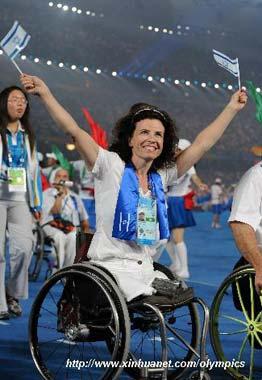 A member of the Paralympic Delegation of Israel parades into the National Stadium during the opening ceremony of the Beijing 2008 Paralympic Games in Beijing, China, Sept. 6, 2008. (Xinhua photo)