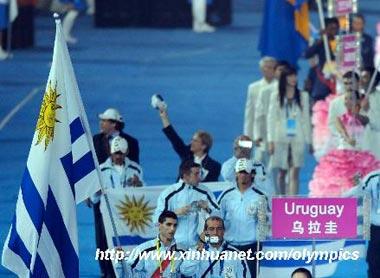 Members of the Paralympic Delegation of Uruguay parade into the National Stadium during the opening ceremony of the Beijing 2008 Paralympic Games in Beijing, China, Sept. 6, 2008.