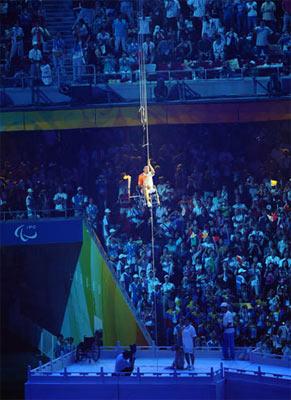 The sixth torchbearer lights the Paralympic flame at the cauldron