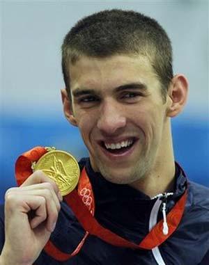 In this Aug. 17, 2008, file photo, United States' Michael Phelps displays his eighth gold medal after the men's 4x100-meter medley relay final during the swimming competitions in the National Aquatics Center at the Beijing 2008 Olympics in Beijing. Phelps acknowledged 'regrettable' behavior and 'bad judgment' after a photo in a British newspaper Sunday, Feb. 1, 2009, showed him inhaling from a marijuana pipe.[Agencies] 
