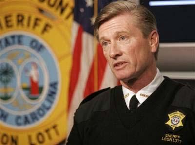 Richland County Sheriff Leon Lott holds a press conference on Monday, Feb. 16, 2009, in Columbia, S.C., to announce that Michael Phelps would not be charged as a result of the photograph that was published, which pictured him smoking from a bong during a November party.(AP Photo/Brett Flashnick) 