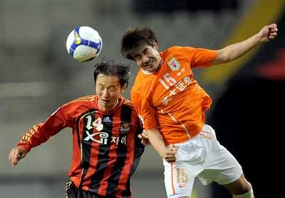 Chinese Super League side Shandong Luneng drew 1-all with South Korea's FC Seoul in a Group F match.