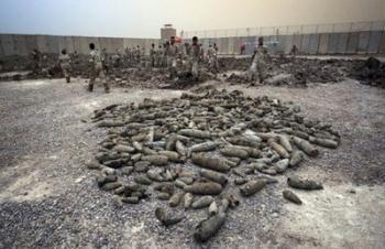 Thousands of unearthed mortar rounds found in southern Baghdad. At least 11 people were killed and 40 wounded in a car bombing in a market area in a town in southern Iraq on Wednesday, a hospital director in the nearby city of Nasiriyah told AFP (AFP/File/David Furst) 