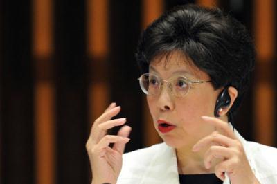 World Health Organization (WHO) Director-General Dr Margaret Chan delares in Geneva that WHO has decided to raise the current A/H1N1 flu alert to its highest level of six on Thursday.(Xinhua/AFP Photo)