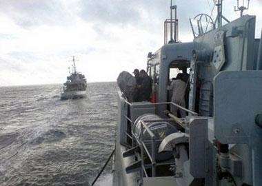 This picture released by the Brazilian Navy of two patrol boats searching for wreckage and corpses of the Air France A330 aircraft that crashed while in midflight over the Atlantic ocean.(AFP/HO)