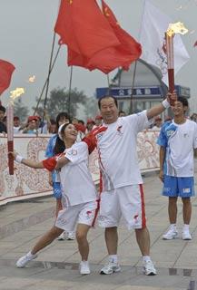 The Olympic torch was taken through an old revolutionary base in east China's Shandong Province on Monday.
