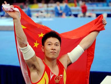 Li Xiaopeng of China celebrates after claiming gold of men's parallel bars final of Beijing 2008 Olympic Games at National Indoor Stadium in Beijing, China, Aug. 19, 2008. (Xinhua Photo)