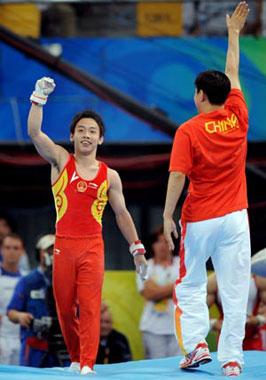 China's Zou Kai celebrates after his performance in men's horizontal bar final of Beijing 2008 Olympic Games at National Indoor Stadium in Beijing, China, Aug. 19, 2008. Zou Kai claimed the title of the event with a score of 16.200. (Xinhua Photo)