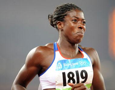 Christine Ohuruogu of Great Britain reacts after the women's 400m final at the National Stadium, also known as the Bird's Nest, during Beijing 2008 Olympic Games in Beijing, China, Aug. 19, 2008. Christine Ohuruogu won the match. (Xinhua/Guo Dayue)