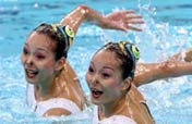 Tearful Chinese synchro swimming twins fail to dance to podium 