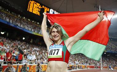 Aksana Miankova of Belarus celebrates after the women's hammer throw final at the National Stadium, also known as the Bird's Nest, during Beijing 2008 Olympic Games in Beijing, China, Aug. 20, 2008. Aksana Miankova won the gold with 76.34 metres and set a new Olympic record.(Xinhua Photo)