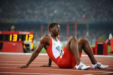 Dayron Robles of Cuba reacts after the men's 110m hurdles semifinal at the National Stadium, also known as the Bird's Nest, during Beijing 2008 Olympic Games in Beijing, China, Aug. 20, 2008.(Xinhua Photo)