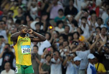 Usain Bolt of Jamaica celebrates after the men's 200m final at the National Stadium, also known as the Bird's Nest, during Beijing 2008 Olympic Games in Beijing, China, Aug. 20, 2008. Usain Bolt of Jamaica won the title with 19.30 seconds and set a new world record. (Xinhua/Guo Dayue)