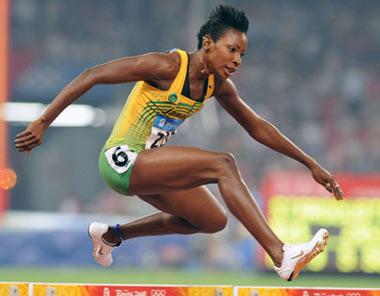 Melaine Walker of Jamaica competes during the women's 400m hurdles final at the National Stadium, also known as the Bird's Nest, during Beijing 2008 Olympic Games in Beijing, China, Aug. 20, 2008. Melaine Walker won the title with 52.64 seconds and set a new Olympic record.(Xinhua/Jiao Weiping)