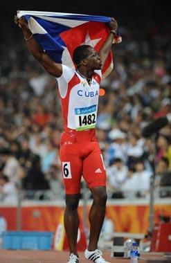 Dayron Robles of Cuba celebrates after the men's 110m hurdles final at the National Stadium, also known as the Bird's Nest, during Beijing 2008 Olympic Games in Beijing, China, Aug. 21, 2008. Dayron Robles won the title.(Xinhua Photo)